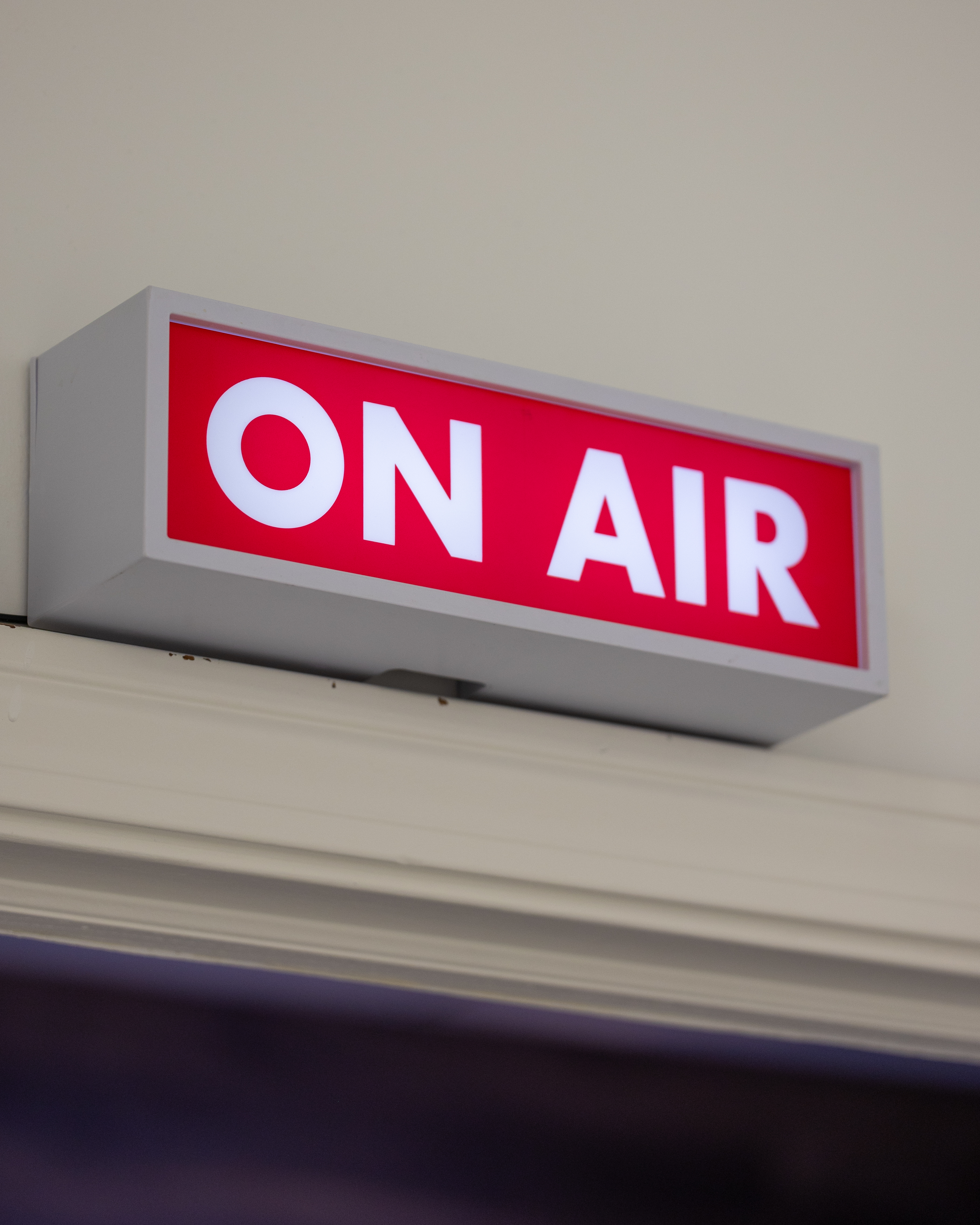 Hosts during podcast recording